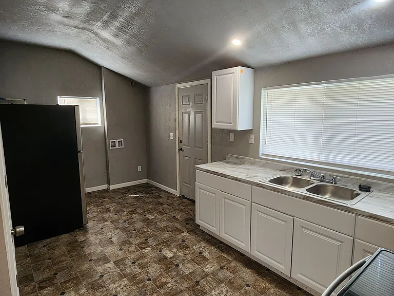 Centrally Located One Bedroom Duplex — Photo 6