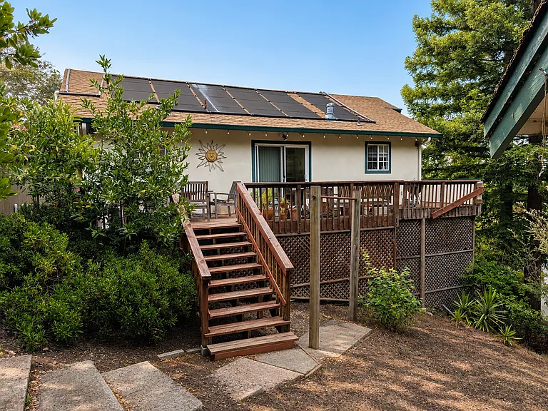View from the back, note that the backyard is unlandscaped.