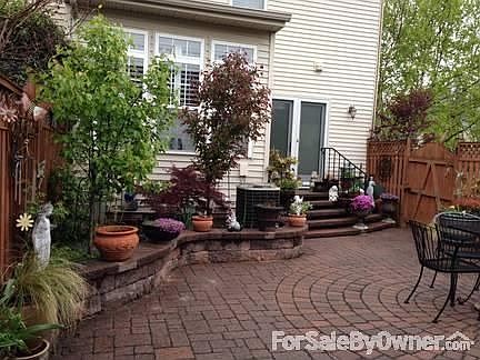 Patio
						:
						Fenced patio between house and detached two-car garage