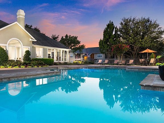 Resort-style swimming pool with sundeck and spa