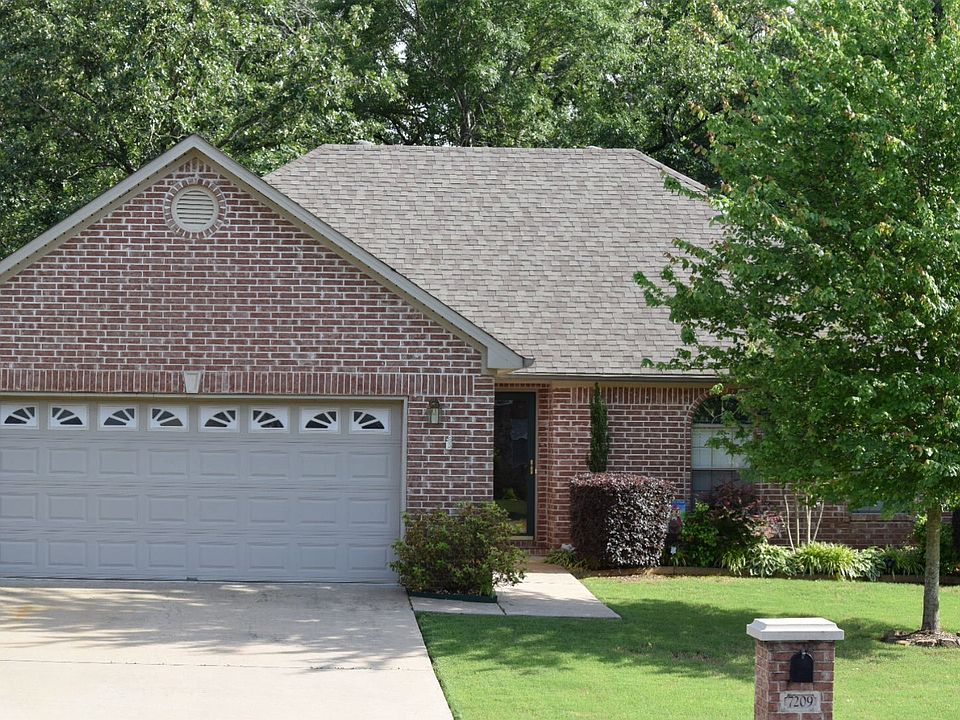 Front yard, 2 car garage