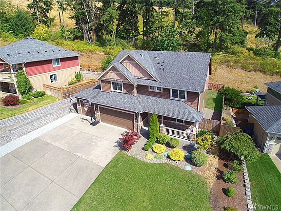 Huge driveway for parking or play. This home has new furnace and A/C and has been lovingly maintained. Seller procured inspectio