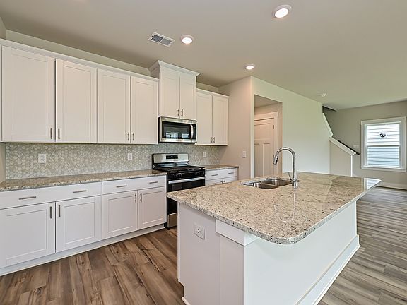 Enjoy your morning tea at the stunning kitchen island.
