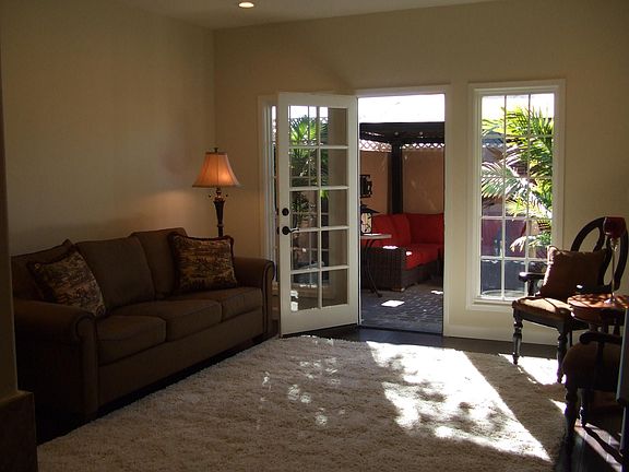 living room with access to large patio