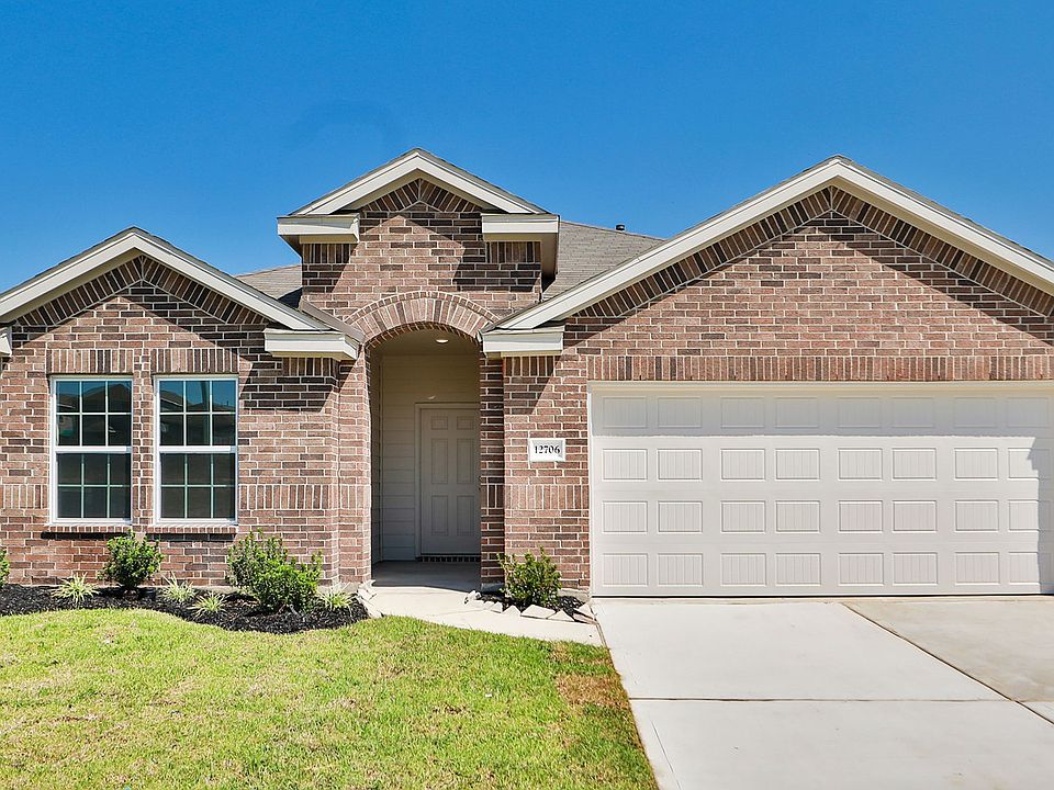 Revel in timeless elegance with this brick facade and lush landscaping, nestled in serene Mostyn Spr