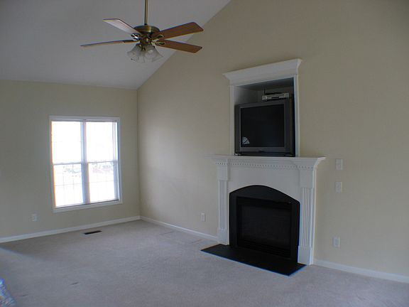 Family room, gas fireplace, cathedral ceiling, ceiling fan, all new paint