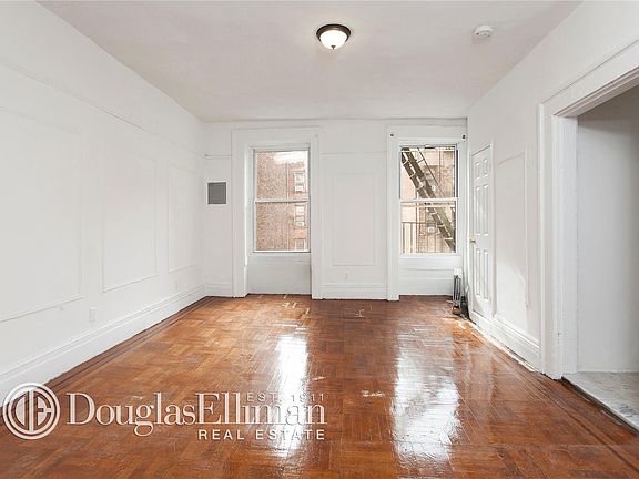 3rd image of 208 E 10th St APT 4