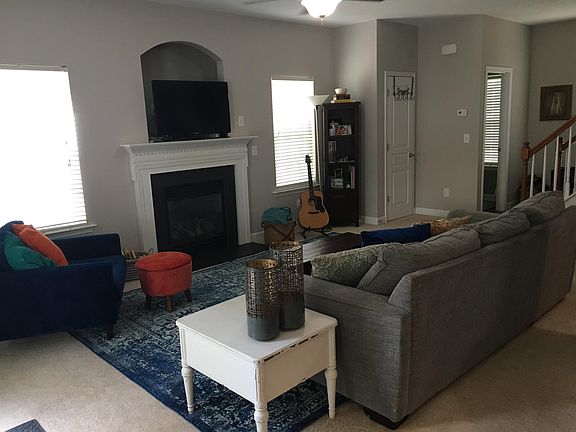 Open concept living room. Half bath, hall closet, Great natural light!