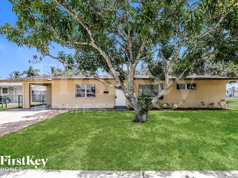 4896 NW 6th Ct — Photo 1