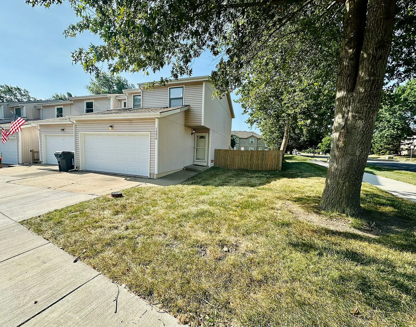  1423 Updated Townhome + Two Car Garage + Fenced Yard + Lawncare Included — Photo 1