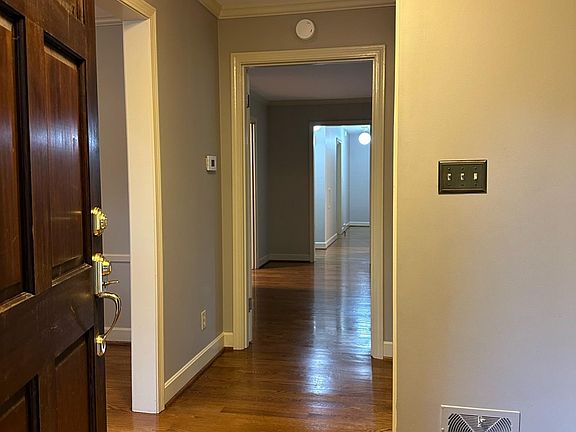 Entry through front door. with hall entry closet just beyond. Dining Room open to the left and formal living room to the right.