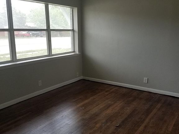 Having custom wooden blinds made for all windows. No ugly mi