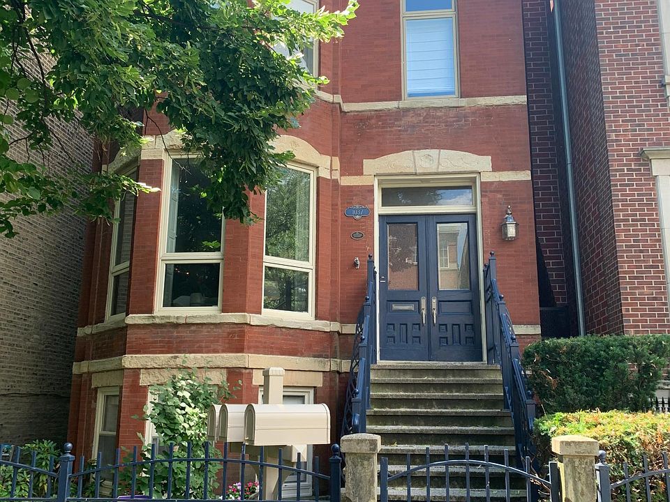 Unit 2 front door through blue doors to the left.