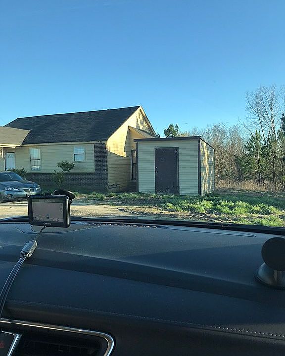 Home with small shed