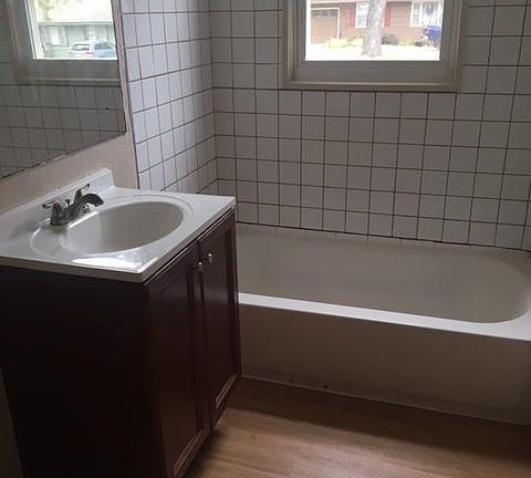 Full bath with shower and tub.