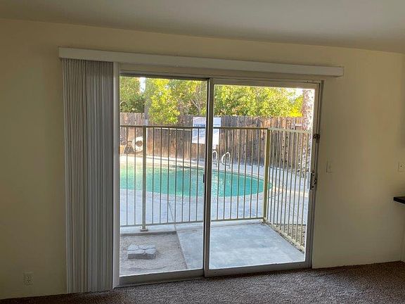 Sliders Open to Pool Deck / Patio