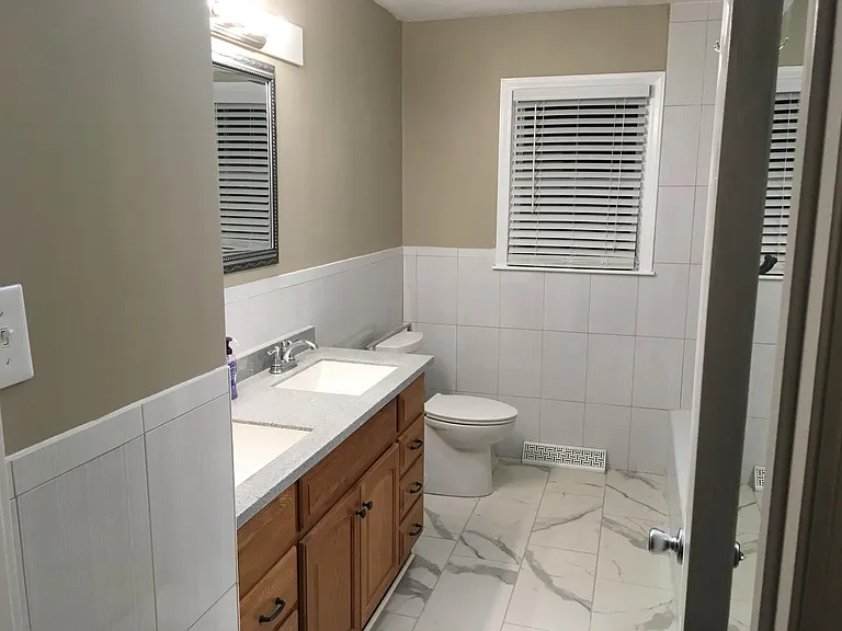 Bathroom features new everything and has plenty of storage space!