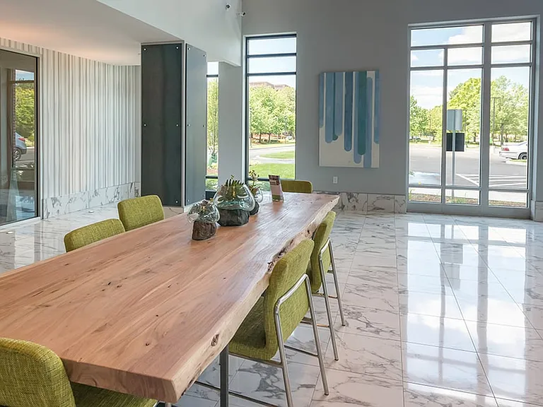 Brightly lit resident lounge ready for work or play