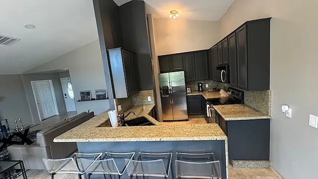 FURNISHED. Kitchen and Bar.