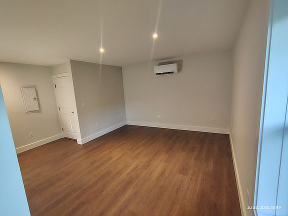 Living room with view of front door.