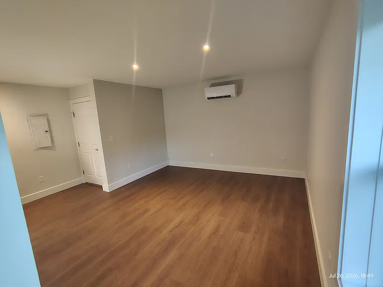 Living room with view of front door.