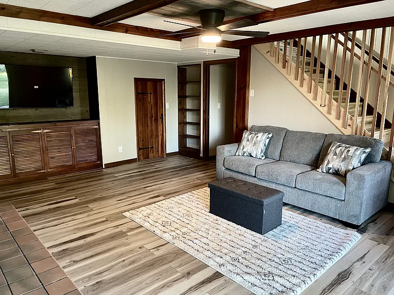Lower-level living space. The laminate flooring continued throughout this level.