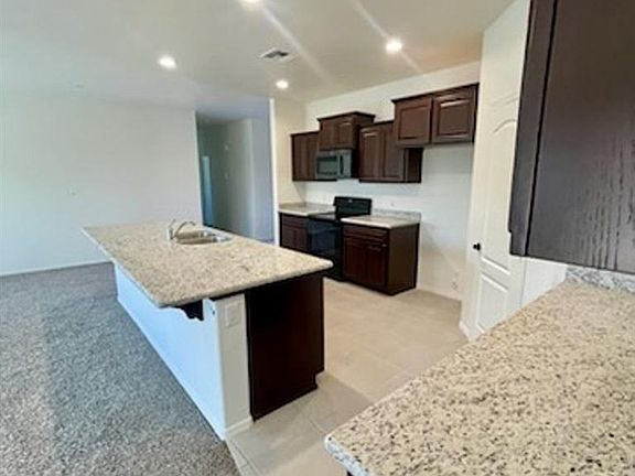5th image of 7649 E 43rd Pl
