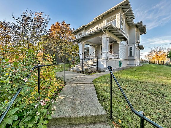 The home sits up from the street and which gives it a commanding presence.