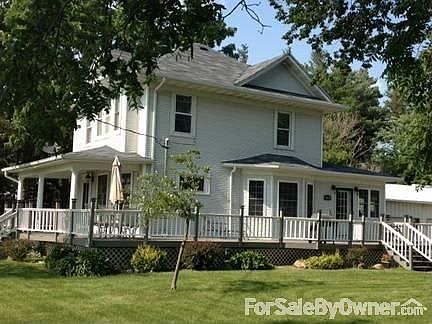 2 story, wrap around porch
						:
						Large windows relaxing setting, large open yard, New shingled roof.