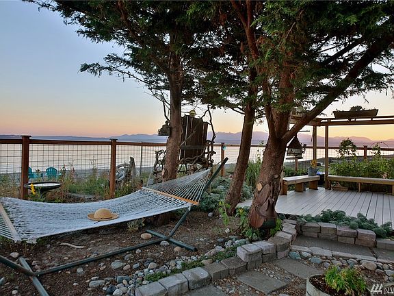 This beachfront area is private and holds all that one needs for waterfront living. Watch osprey and eagles dive for fish while ships glide by in the distance. The majestic Olympics are your backdrop. 