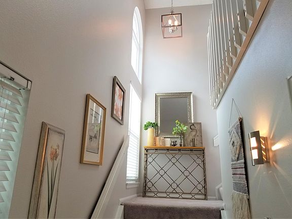 View of landing from front door and garage entry.