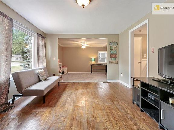 1st of 2 living rooms, with tons of natural light