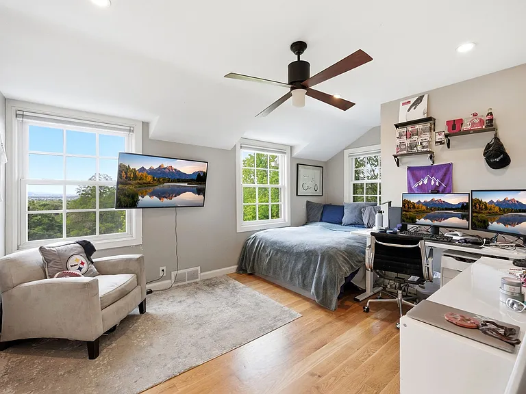 2nd bedroom upstairs with beautiful large windows facing the Salt Lake Valley.