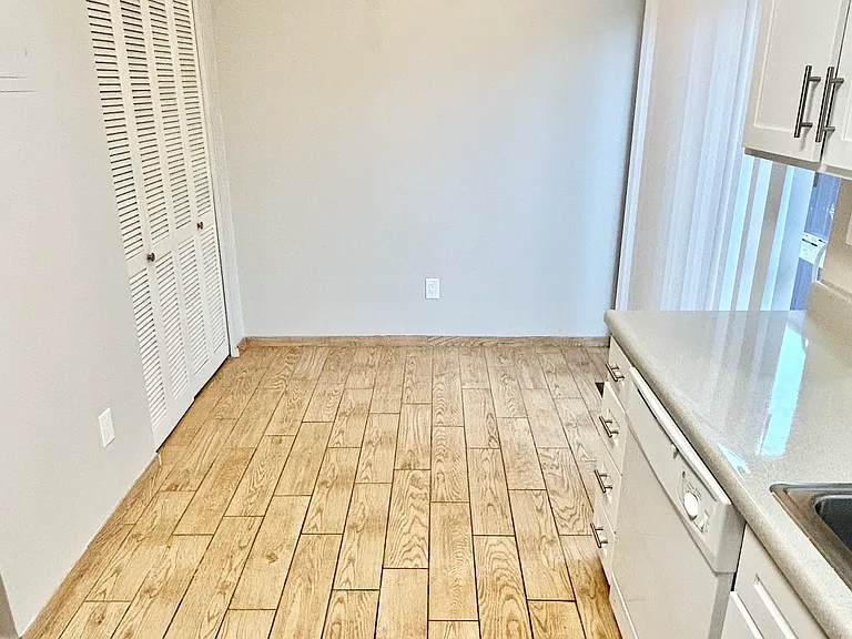 Step into this bright kitchen designed for modern living with stylish wood flooring. Step into this bright kitchen designed for modern living with stylish wood flooring.