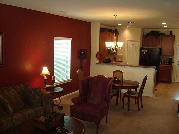 As you enter the home you are greeted by the warm ambiance of the formal living and dining rooms!