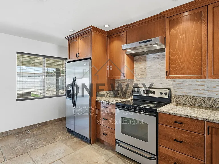8702 E Sheridan St — Photo 8