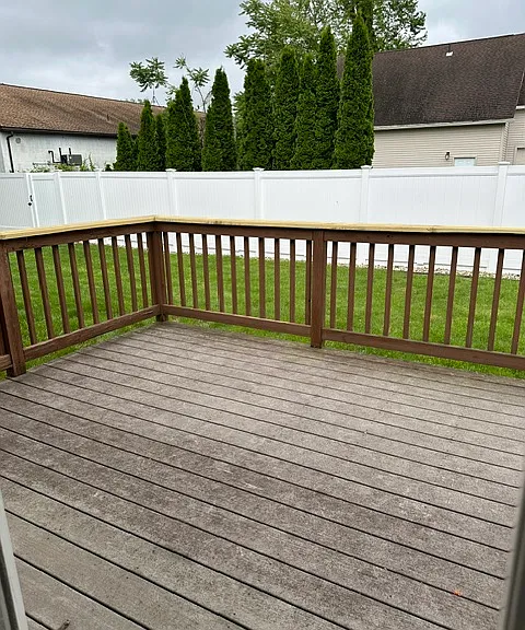 Back deck off kitchen and back yard