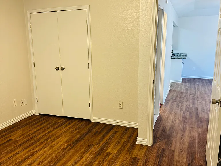 Main bedroom and hallway to living room.