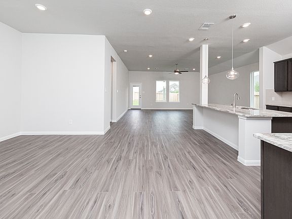 Dining Area to Kitchen and Family Room