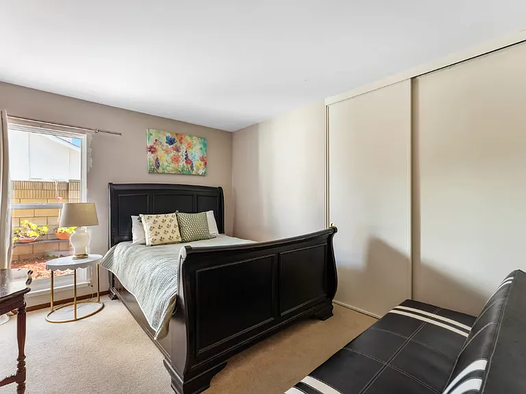 Bedroom 2- This picture shows how spacious the bedrooms are. All bedrooms also has big sliding door closets.