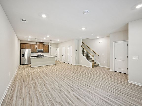 The Lancaster floorplan with the Calm Burlap interior package.