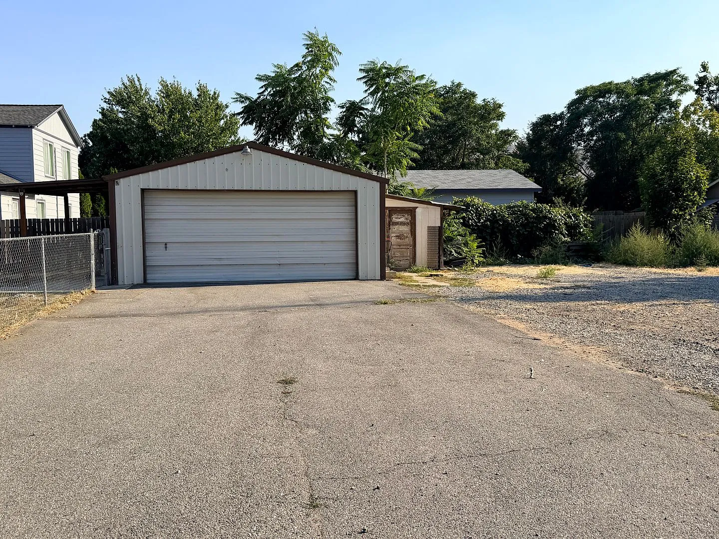 Spacious 2 bed/1 bath home! Fenced yard, a/c, d/w, w/d, large garage and MORE!! — Photo 4