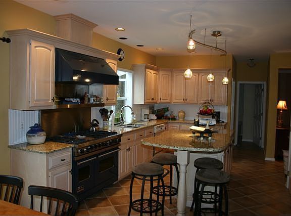 Eat-in kitchen with slider to large deck