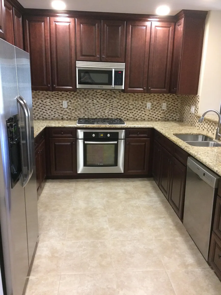 Cherry cabinets, Bosch appliances, open concept with breakfast bar - 4100 W Hood Ave
