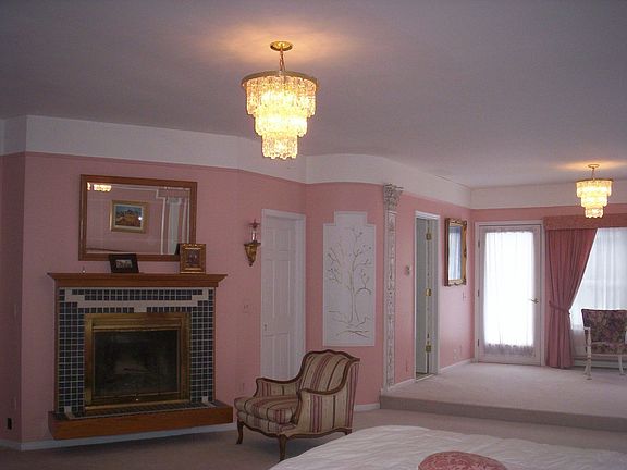 master bedroom w/fireplace & sitting area