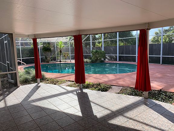Large covered lanai screened
