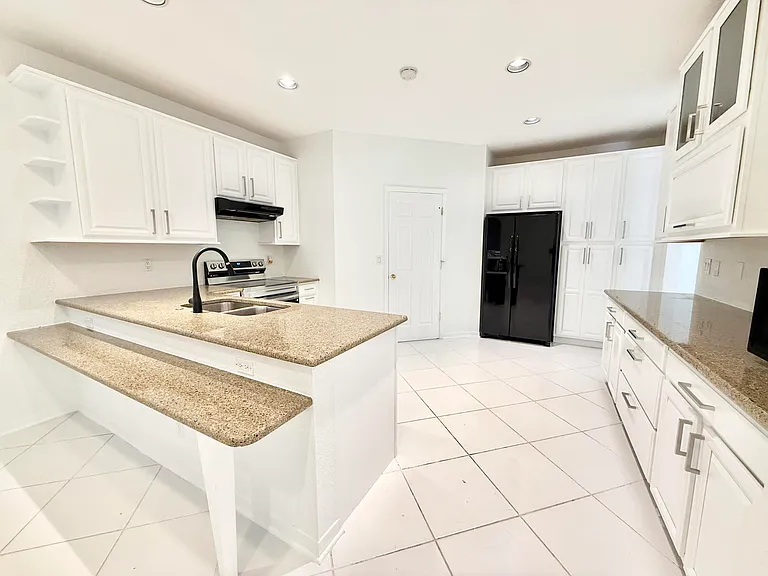 12310 Riverfalls Ct — Photo 3
