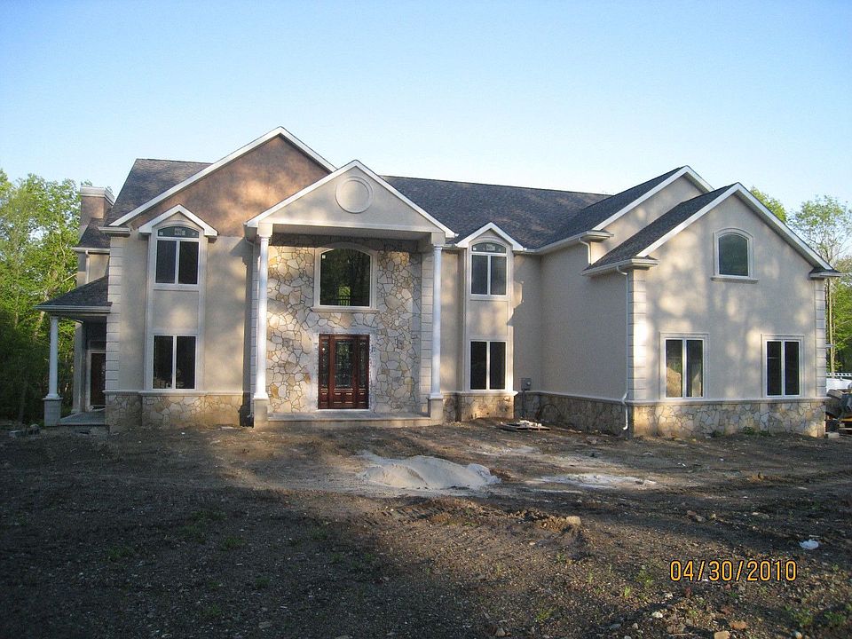 Stucco w/Gorgeous Mahogany Entry Door...