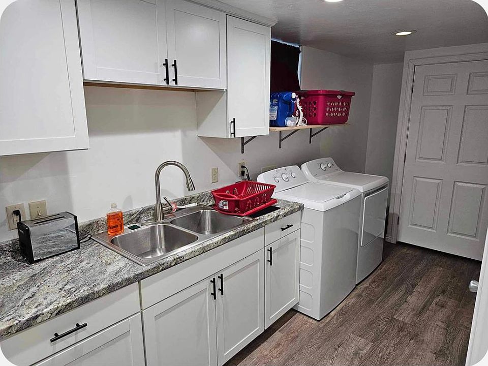 View of kitchen showing placement of washer and dryer.