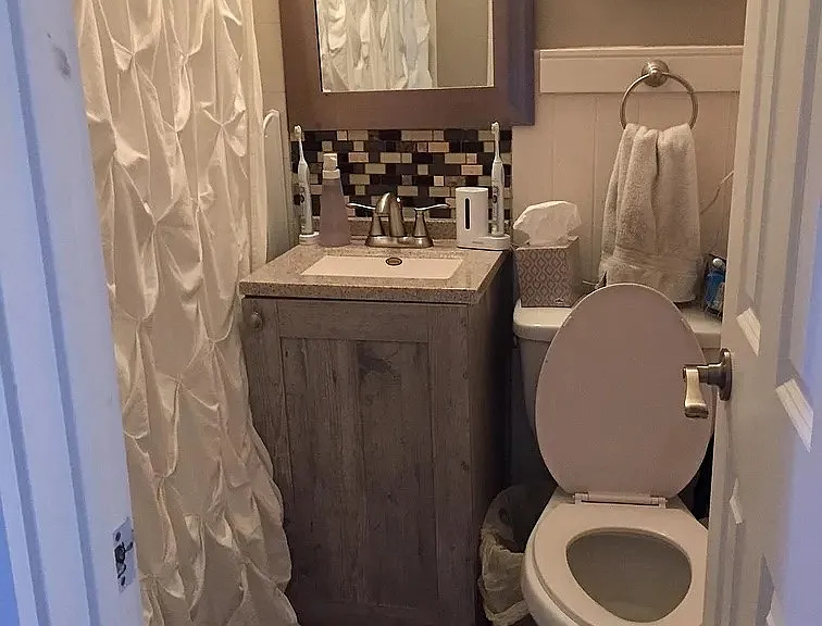 Elevate your lifestyle with the stylish and functional bathroom at LS Capital Group. Modern fixtures and thoughtful design details create a serene retreat. Schedule your tour today to see all the exceptional features this property offers!